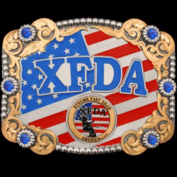 "Our Sanger Belt Buckle is a proud tribute to the American spirit and the thrill of fast-draw competition. Set against a bold red, white, and blue backdrop, this buckle features Jeweler's Bronze overlays and 6 striking cubic zirconia stones. 

Cust